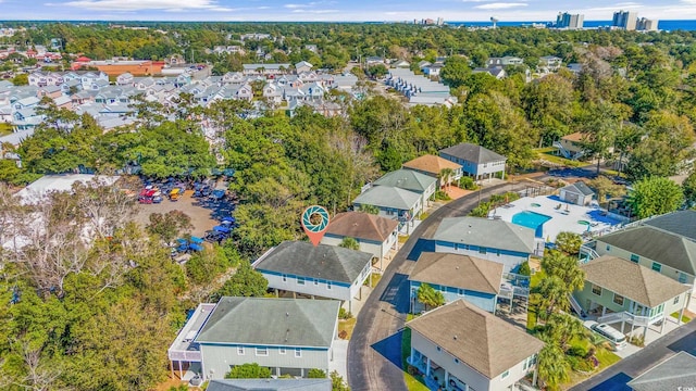 820 9th Ave S, North Myrtle Beach, SC 29582 - aerial perspective of suburban area with a pool area