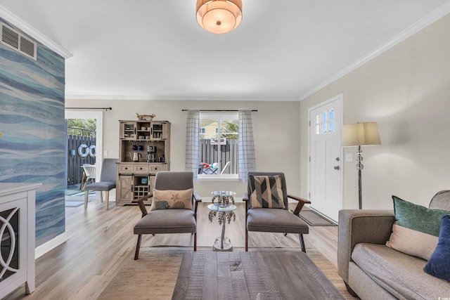 800 9th Ave S Unit A-4, North Myrtle Beach, SC 29582 - living area with visible vents, plenty of natural light, and wood finished floors