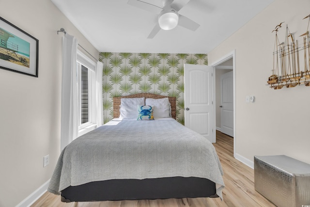 800 9th Ave S Unit A-4, North Myrtle Beach, SC 29582 - bedroom with baseboards, a ceiling fan, and light wood-type flooring