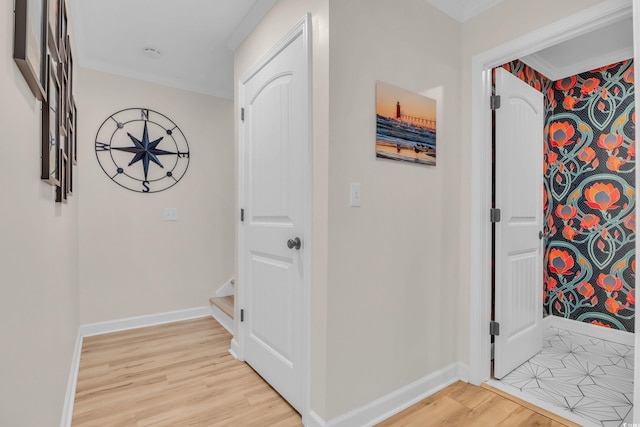 800 9th Ave S Unit A-4, North Myrtle Beach, SC 29582 - hallway with stairs, baseboards, crown molding, and light wood-style flooring