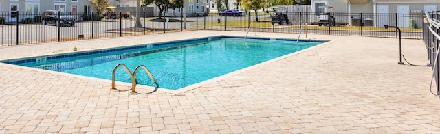 800 9th Ave S Unit A-4, North Myrtle Beach, SC 29582 - pool featuring fence and a residential view