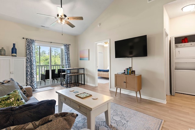 102 Scotch Broom Dr Unit B-302, Little River, SC 29566 - living room with lofted ceiling, ceiling fan, visible vents, baseboards, and light wood-type flooring