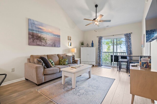 102 Scotch Broom Dr Unit B-302, Little River, SC 29566 - living area featuring wood finished floors, ceiling fan, vaulted ceiling, and baseboards