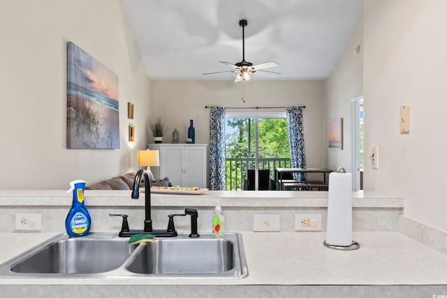 102 Scotch Broom Dr Unit B-302, Little River, SC 29566 - kitchen with a ceiling fan, open floor plan, light countertops, and a sink