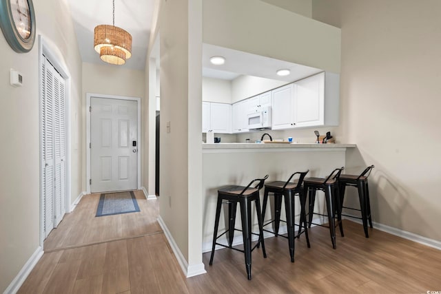 102 Scotch Broom Dr Unit B-302, Little River, SC 29566 - corridor featuring wood finished floors and baseboards