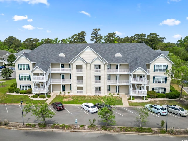 102 Scotch Broom Dr Unit B-302, Little River, SC 29566 - view of building exterior with uncovered parking