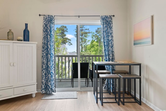 102 Scotch Broom Dr Unit B-302, Little River, SC 29566 - entryway featuring wood finished floors, plenty of natural light, and baseboards