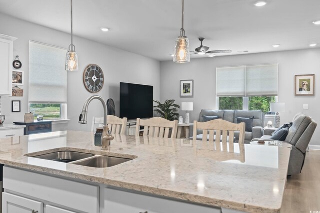 239 Calhoun Falls Dr, Myrtle Beach, SC 29579 - kitchen featuring a sink, ceiling fan, open floor plan, hanging light fixtures, and recessed lighting