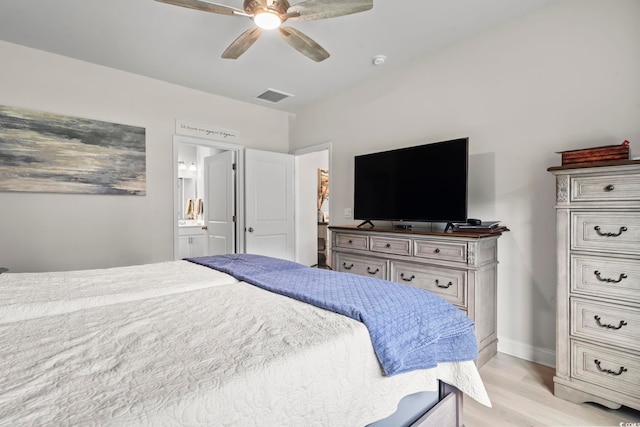 239 Calhoun Falls Dr, Myrtle Beach, SC 29579 - bedroom with light wood-style flooring, baseboards, ensuite bath, and a ceiling fan