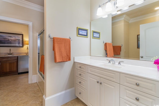 bathroom featuring vanity, ornamental molding, baseboards, and an enclosed shower