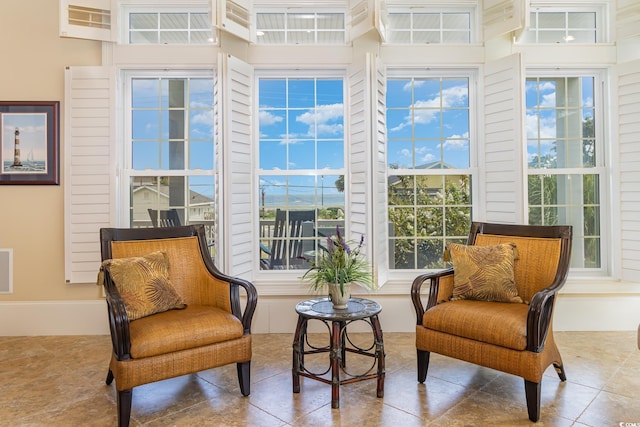 sitting room with tile patterned floors