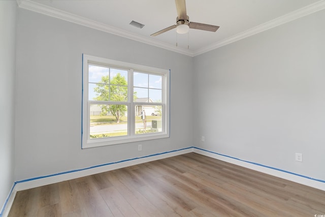1500 Sunmeadow Dr, Conway, SC 29526 - empty room featuring wood finished floors, crown molding, a ceiling fan, and baseboards