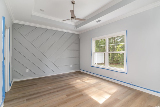 1500 Sunmeadow Dr, Conway, SC 29526 - unfurnished room with ornamental molding, light wood-style floors, ceiling fan, baseboards, and a decorative wall