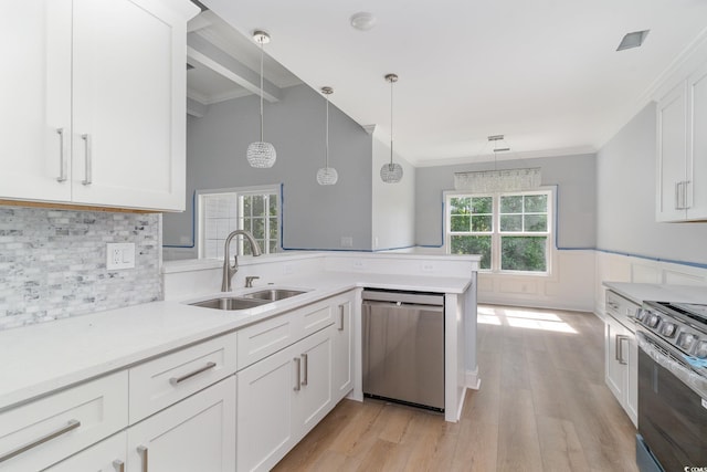 1500 Sunmeadow Dr, Conway, SC 29526 - kitchen featuring appliances with stainless steel finishes, a sink, a peninsula, light countertops, and white cabinets