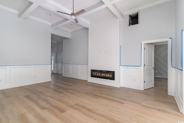 1500 Sunmeadow Dr, Conway, SC 29526 - unfurnished living room with beam ceiling, coffered ceiling, a decorative wall, a fireplace, and ceiling fan