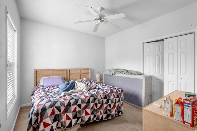1058 Sea Mountain Hwy Unit 5-301, North Myrtle Beach, SC 29582 - bedroom with light carpet, a ceiling fan, and a closet