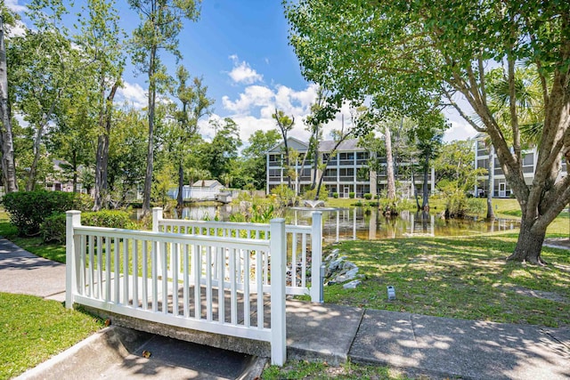1058 Sea Mountain Hwy Unit 5-301, North Myrtle Beach, SC 29582 - view of home's community with a lawn and a water view