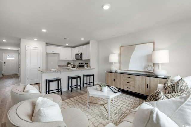 336 Bayou Loop Lot 71, Surfside Beach, SC 29575 - living room with recessed lighting, baseboards, and light wood-type flooring