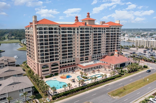 view of building exterior with a water view