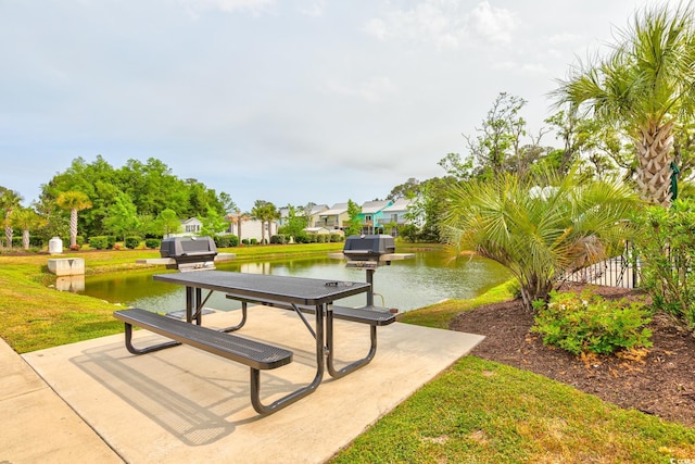 128 Puffin Dr Unit 1-E, Pawleys Island, SC 29585 - view of home's community featuring a yard and a water view