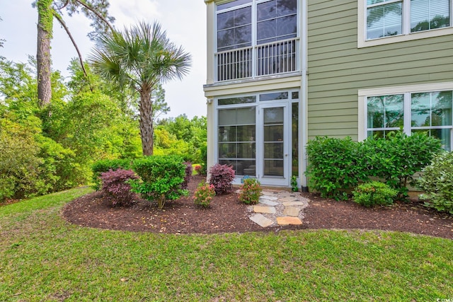 128 Puffin Dr Unit 1-E, Pawleys Island, SC 29585 - property entrance with a yard