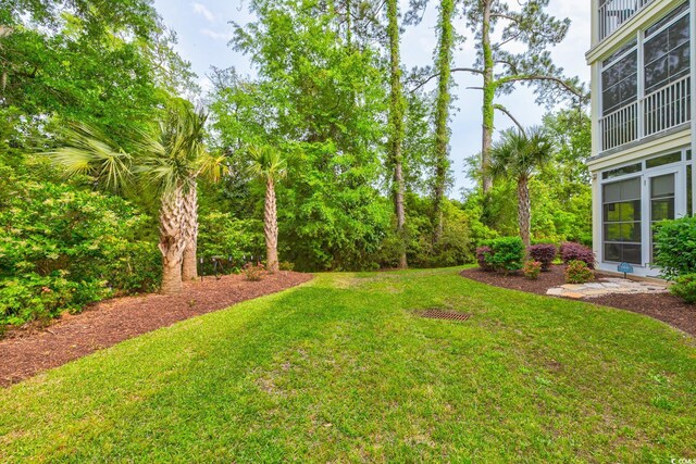 128 Puffin Dr Unit 1-E, Pawleys Island, SC 29585 - view of grassy yard