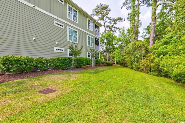 128 Puffin Dr Unit 1-E, Pawleys Island, SC 29585 - view of grassy yard