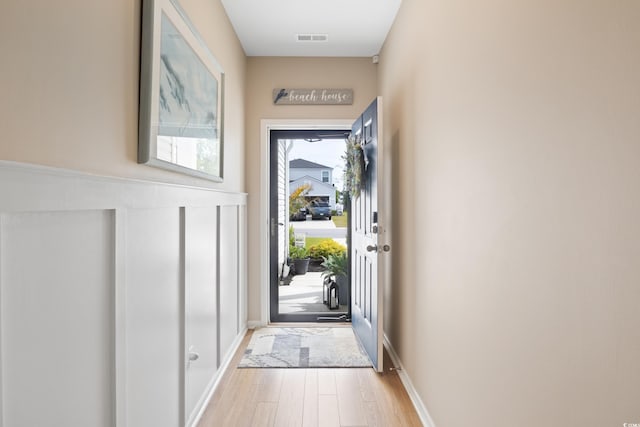 179 S Reindeer Rd, Surfside Beach, SC 29575 - entryway featuring baseboards, wood finished floors, and visible vents