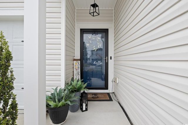 179 S Reindeer Rd, Surfside Beach, SC 29575 - view of exterior entry featuring a garage