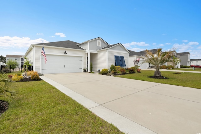 179 S Reindeer Rd, Surfside Beach, SC 29575 - ranch-style home with concrete driveway, a front lawn, board and batten siding, fence, and a garage
