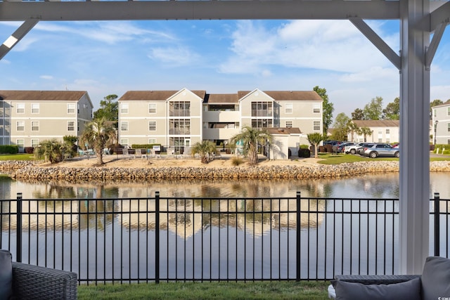 179 S Reindeer Rd, Surfside Beach, SC 29575 - view of water feature featuring fence and a residential view