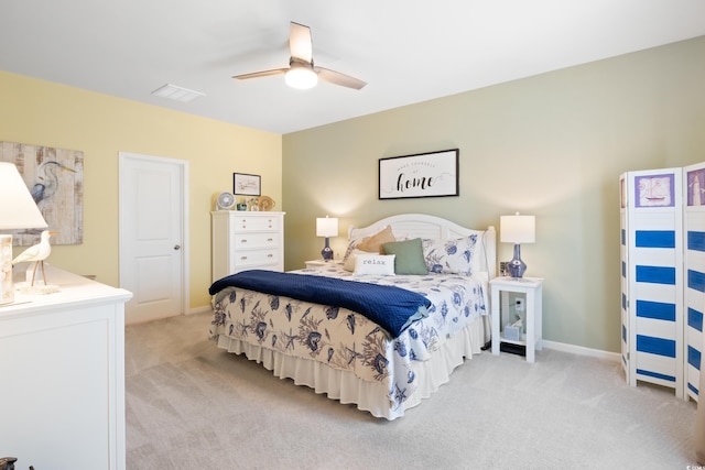 179 S Reindeer Rd, Surfside Beach, SC 29575 - bedroom featuring baseboards, visible vents, light colored carpet, and ceiling fan