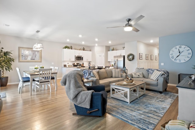 179 S Reindeer Rd, Surfside Beach, SC 29575 - living area featuring recessed lighting, light wood-style flooring, baseboards, and ceiling fan
