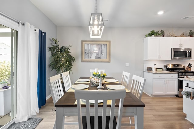 179 S Reindeer Rd, Surfside Beach, SC 29575 - dining space with recessed lighting, visible vents, and light wood finished floors