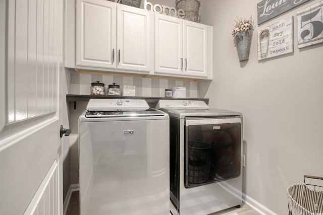 830 San Marco Ct Unit 2603-B, Myrtle Beach, SC 29579 - washroom featuring baseboards, independent washer and dryer, and cabinet space