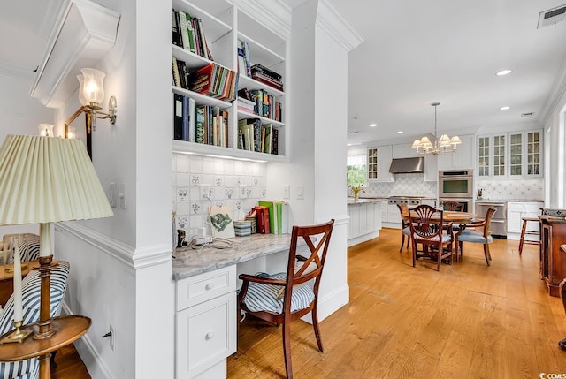 486 Lantana Cir, Georgetown, SC 29440 - office space featuring light wood finished floors, a chandelier, recessed lighting, and ornamental molding