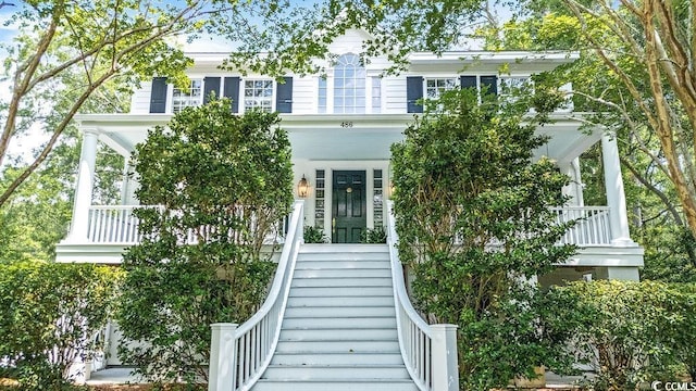 486 Lantana Cir, Georgetown, SC 29440 - view of property hidden behind natural elements with a porch and stairway