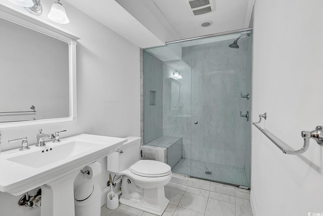 486 Lantana Cir, Georgetown, SC 29440 - bathroom with toilet, a shower stall, and marble finish flooring