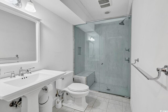 486 Lantana Cir, Georgetown, SC 29440 - bathroom with toilet, a shower stall, and marble finish flooring