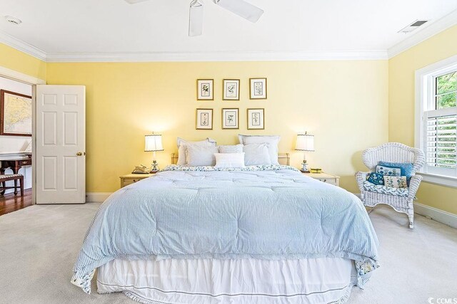 486 Lantana Cir, Georgetown, SC 29440 - bedroom with carpet, crown molding, baseboards, and a ceiling fan