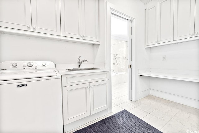 486 Lantana Cir, Georgetown, SC 29440 - laundry area with washer / clothes dryer, light marble finish flooring, and cabinet space