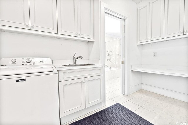 486 Lantana Cir, Georgetown, SC 29440 - laundry area with washer / clothes dryer, light marble finish flooring, and cabinet space