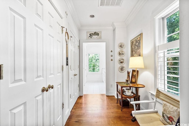 486 Lantana Cir, Georgetown, SC 29440 - foyer featuring wood finished floors, crown molding, and baseboards