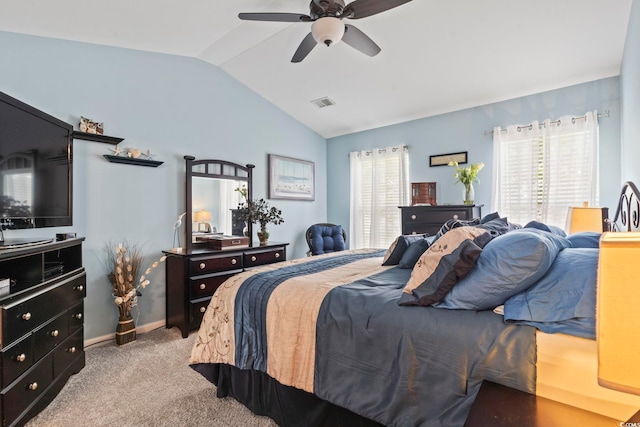 216 Whitchurch St, Murrells Inlet, SC 29576 - carpeted bedroom with baseboards, visible vents, multiple windows, and lofted ceiling