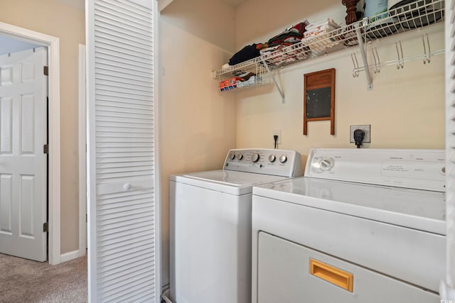 216 Whitchurch St, Murrells Inlet, SC 29576 - clothes washing area featuring baseboards, light carpet, independent washer and dryer, and laundry area