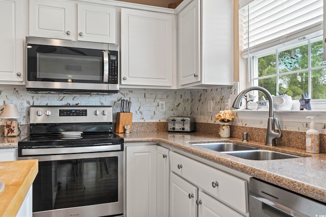 216 Whitchurch St, Murrells Inlet, SC 29576 - kitchen featuring a sink, white cabinetry, wooden counters, and stainless steel appliances
