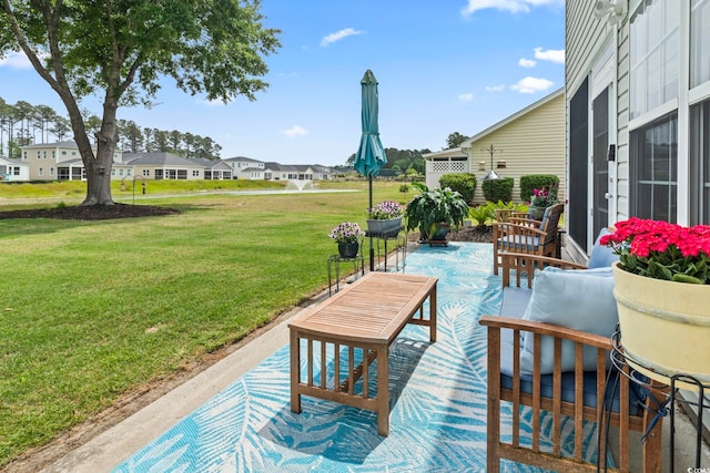 216 Whitchurch St, Murrells Inlet, SC 29576 - view of patio featuring a residential view