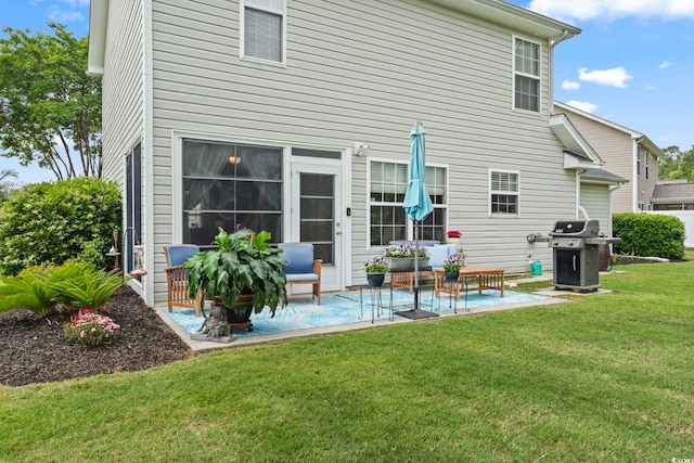 216 Whitchurch St, Murrells Inlet, SC 29576 - rear view of property with a lawn and a patio area