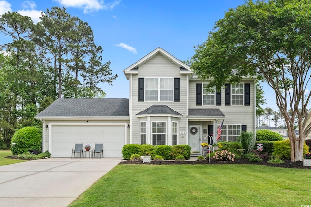 216 Whitchurch St, Murrells Inlet, SC 29576 - traditional-style home with an attached garage, driveway, and a front lawn