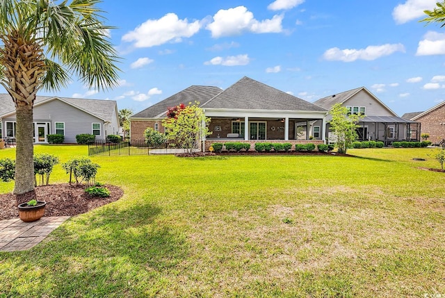 120 Whitemarsh Ct, Murrells Inlet, SC 29576 - view of front of property with brick siding, fence, roof with shingles, and a front yard